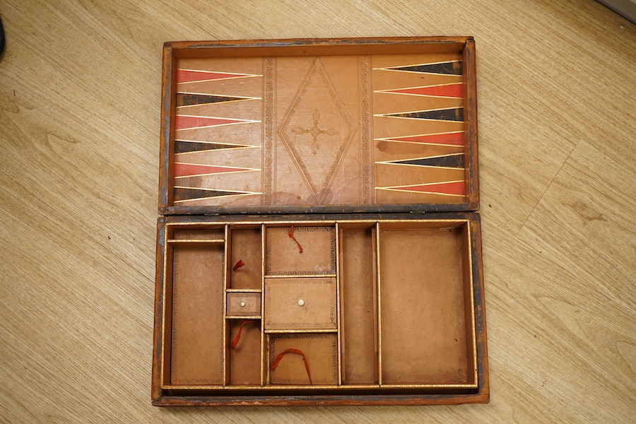Three late 19th/early 20th century folding chess/backgammon boards fashioned as books